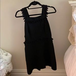 black dress with cute Pom poms